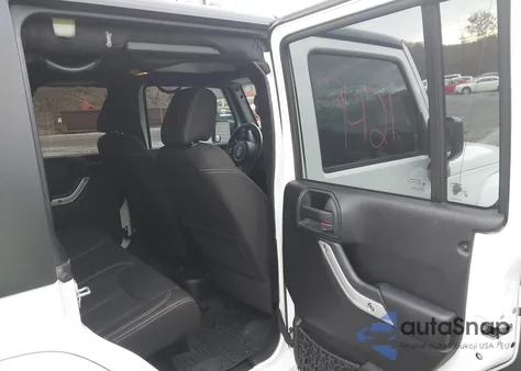 2015 Jeep Wrangler Unlimited Sahara z USA, uszkodzony, nr VIN 1C4BJWEG3FL689800